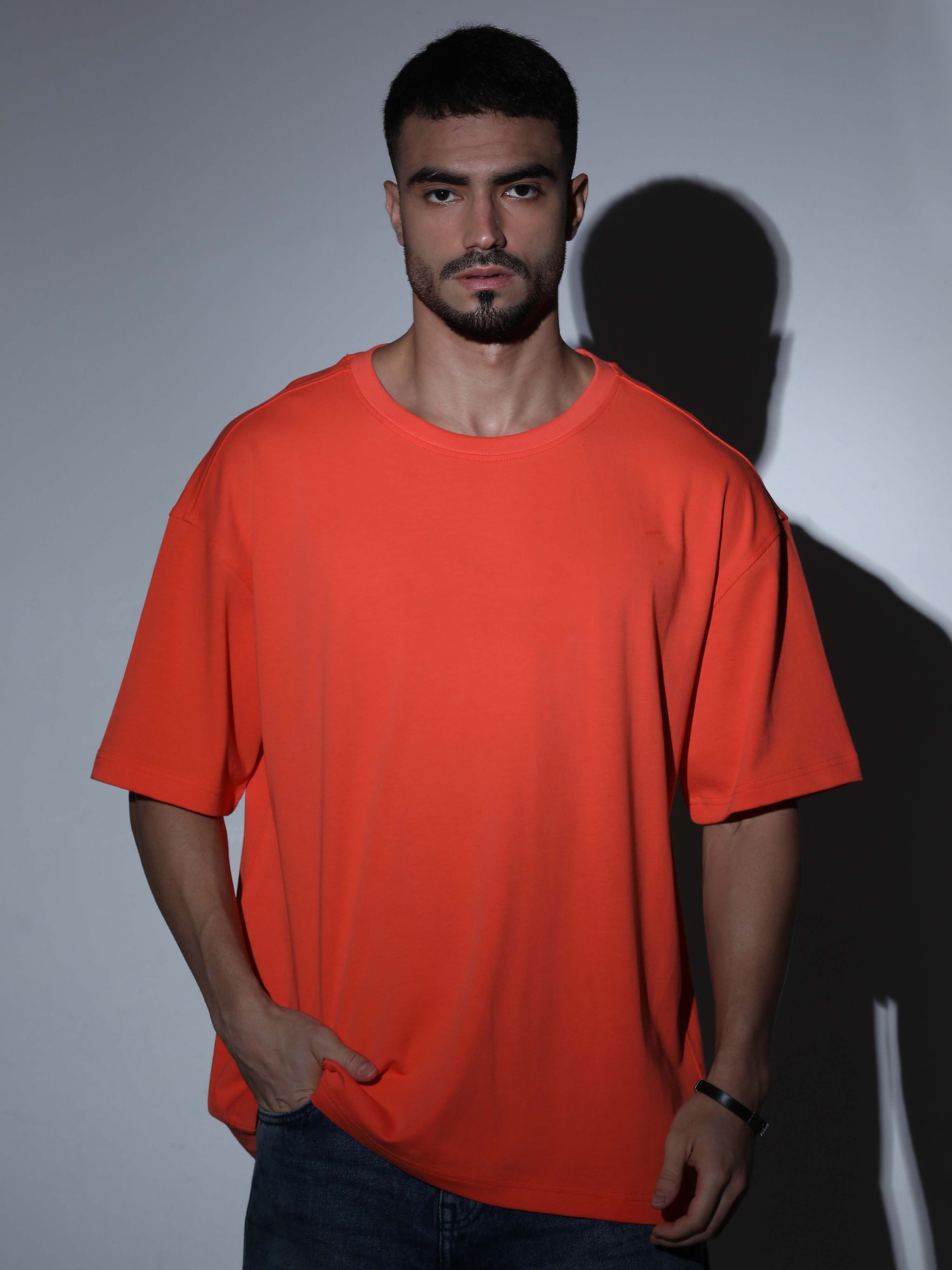 Oversized Tee Heavy Jersey Cotton Orange - Front Hands Clasped With Chair